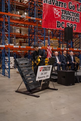 Photo: Tractor Supply CEO Hal Lawton cuts a pallet to officially open the company’s newest distribution center in Navarre, OH. (Photo: Business Wire)