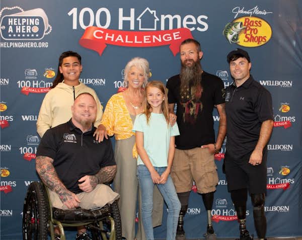 Photo of Wounded Warrior and his Family receiving new home