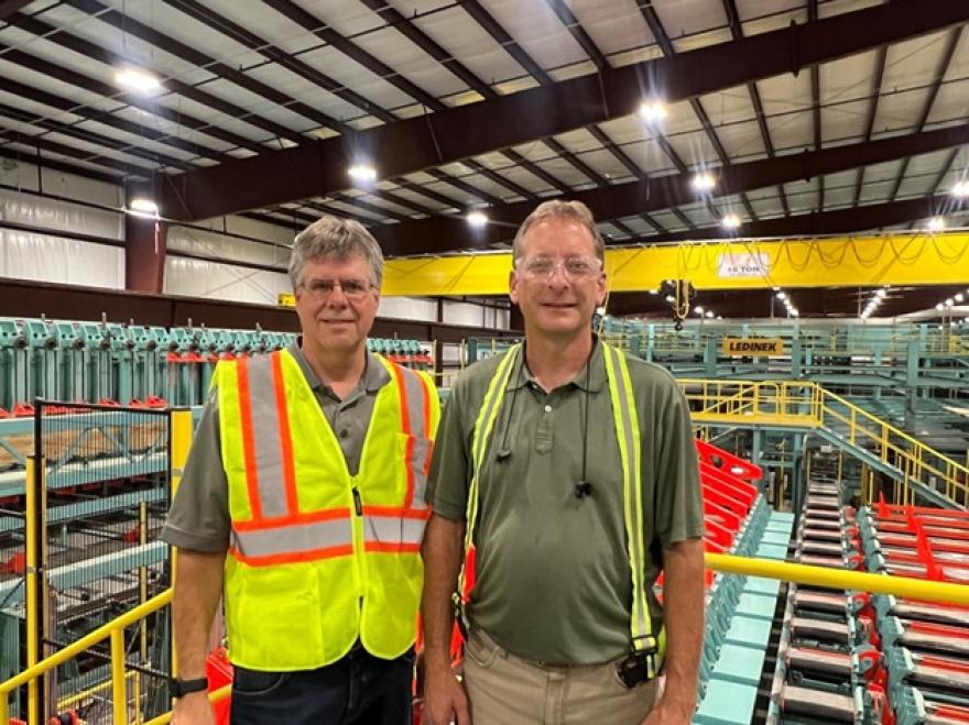 SmartLam North America CEO Derek Ratchford and Forest Service Brian Brashaw touring their new Dothan, Alabama, glulam production plant prior to start-up. (USDA Forest Service image)